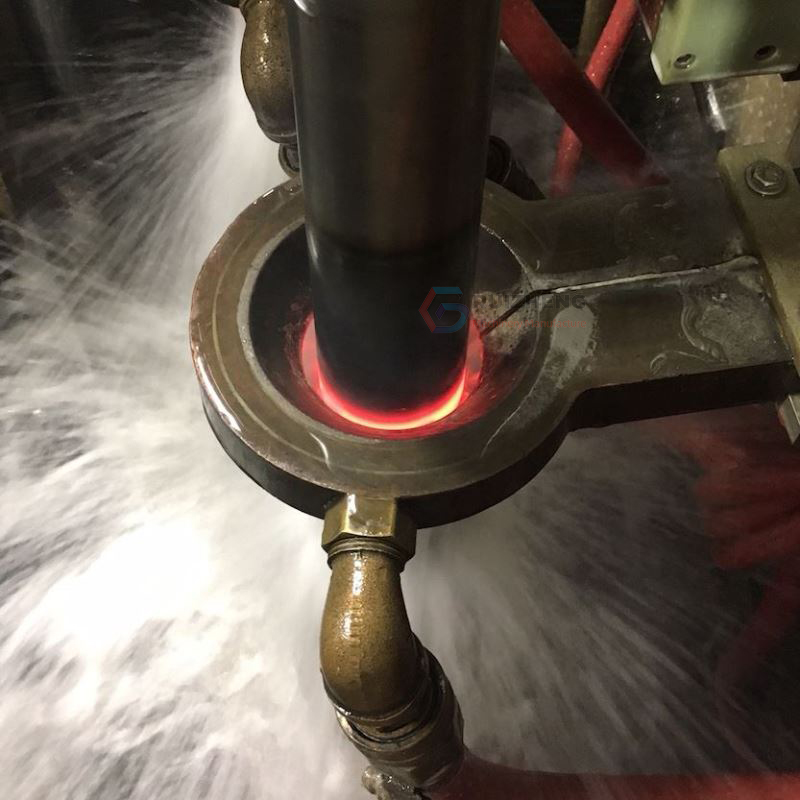 Metal parts undergoing heat treatment process for enhanced durability.